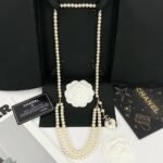 Chanel Double Strand Pearl Necklace with Heart Shaped Charm - Image 2