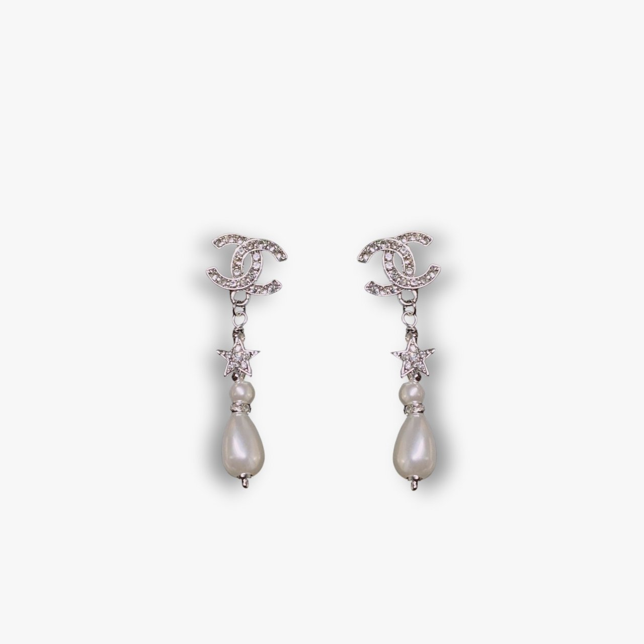 486-1-1.jpg Chanel CC Crystal Star And Pearl Earrings Silver - Image 1