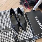 Chanel Pointed Toe Doll Shoes With Gold Flower In Black - Image 7