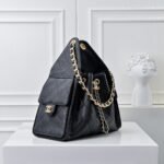 Chanel 25 Handbag, vintage black and gold, classic chain design - Image 2
