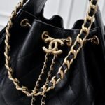 Chanel 25 Handbag, vintage black and gold, classic chain design - Image 5
