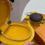 Louis Vuitton LV Turtle Pouch Bag Charm Monogram Yellow Black 12cm - Image 7